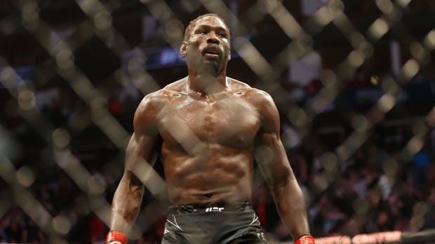 Feb 12, 2022; Houston, Texas, UNITED STATES; Jared Cannonier (red gloves) reacts after the fight against Derek Brunson (Blue Gloves) during UFC 271 at Toyota Center.